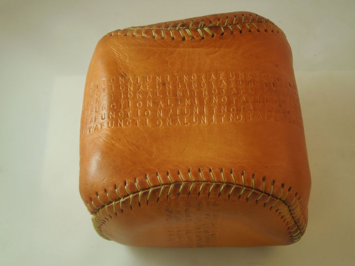 Hand made ball-like object.