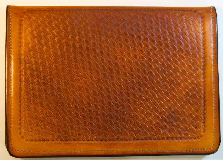 Front of iPad_Air case with basket stamping. All hand made.